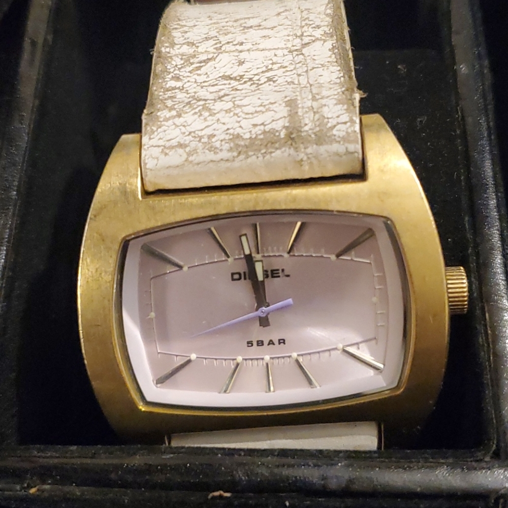 Diesel pink face with worn leather band